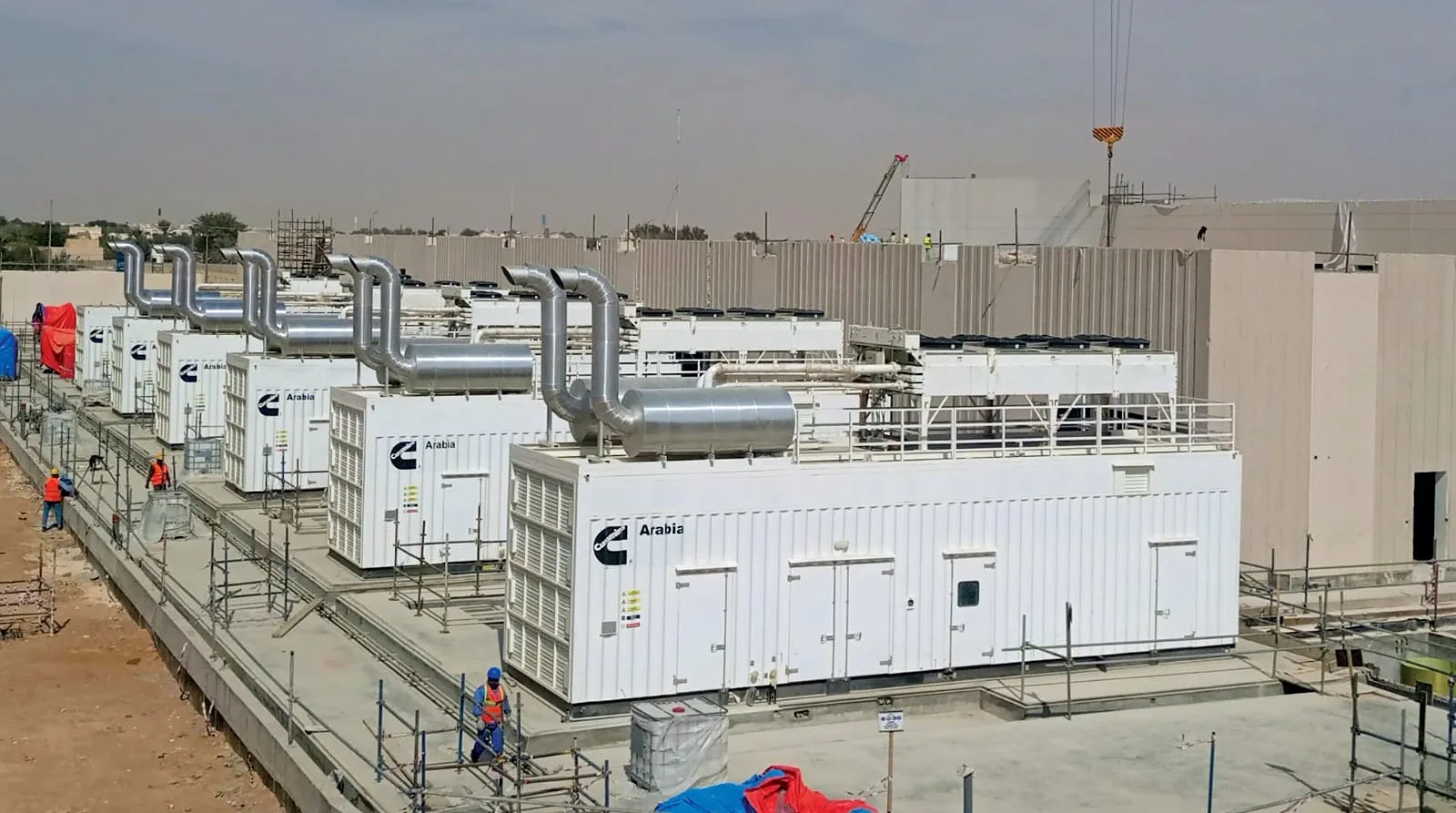 Row of Cummins standby generator sets at a job site — Houston, TX