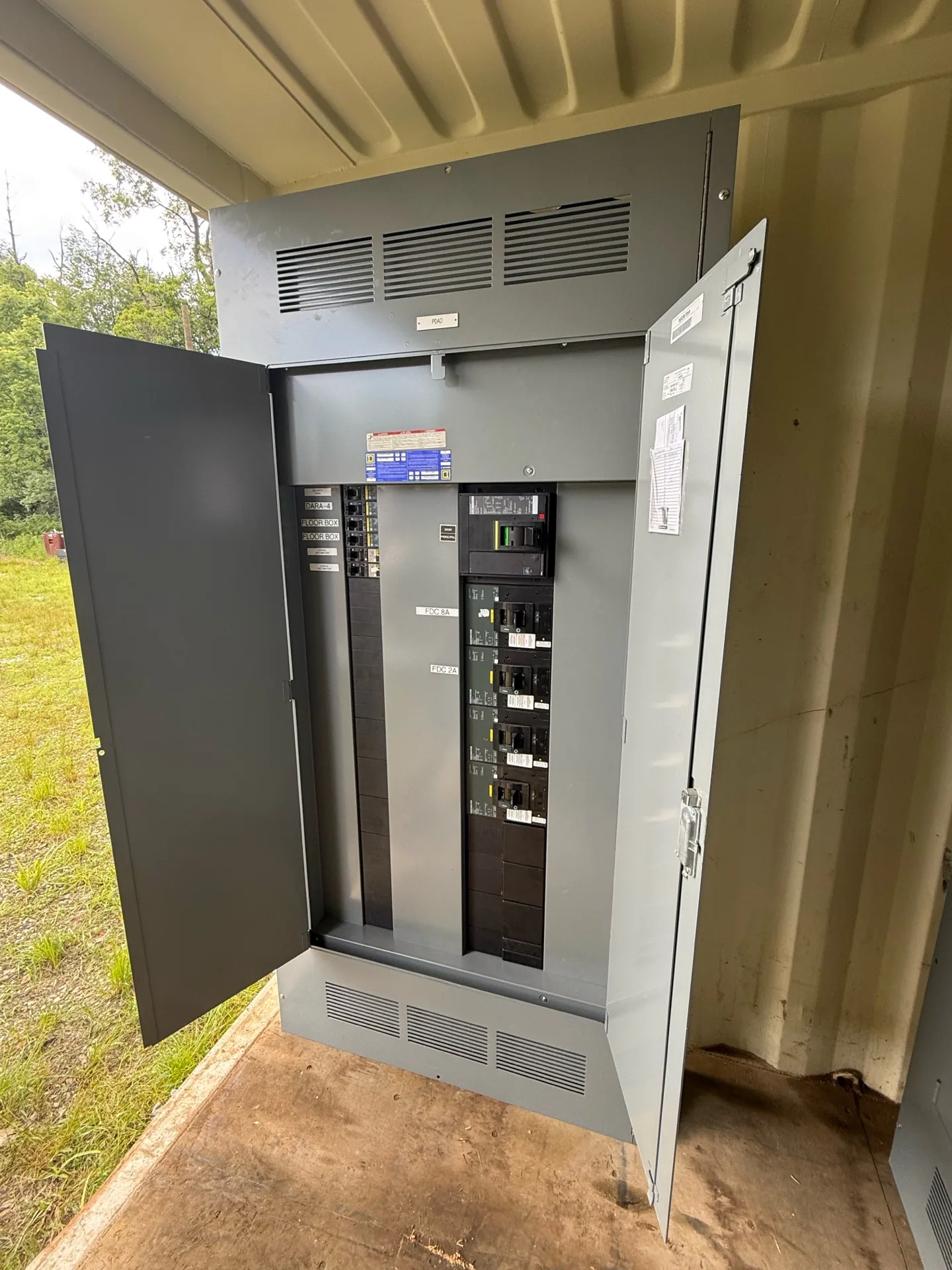 Panelboard with the door open showing branch breakers — Houston, TX