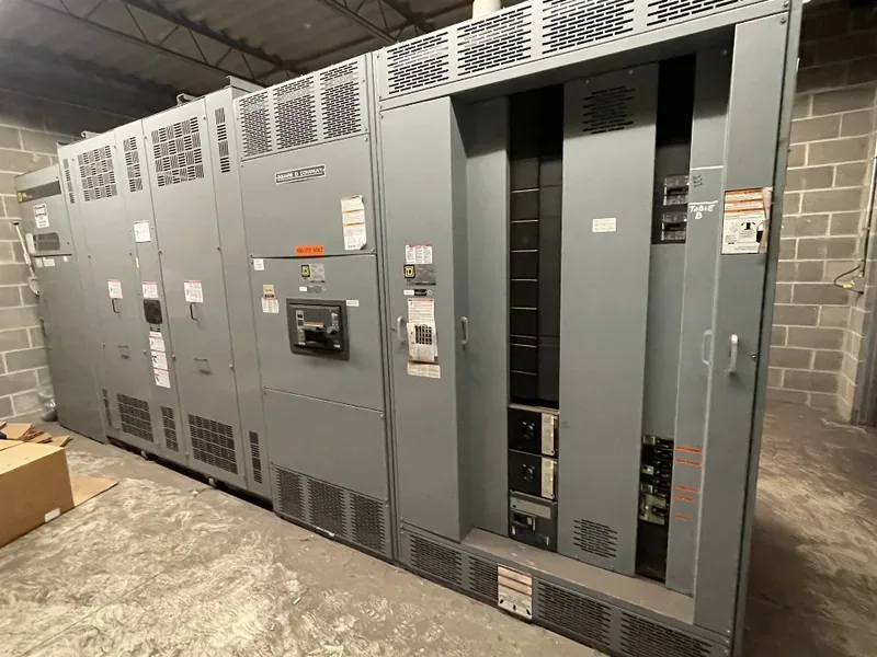 Medium-voltage switchgear line-up staged in a warehouse — Houston, TX