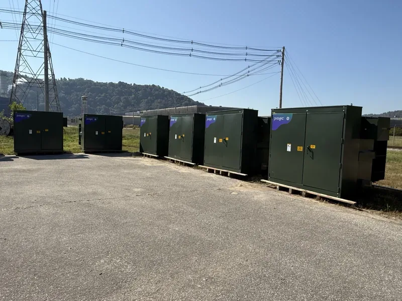 Line of pad-mount transformers under high-voltage transmission lines — Dallas, TX