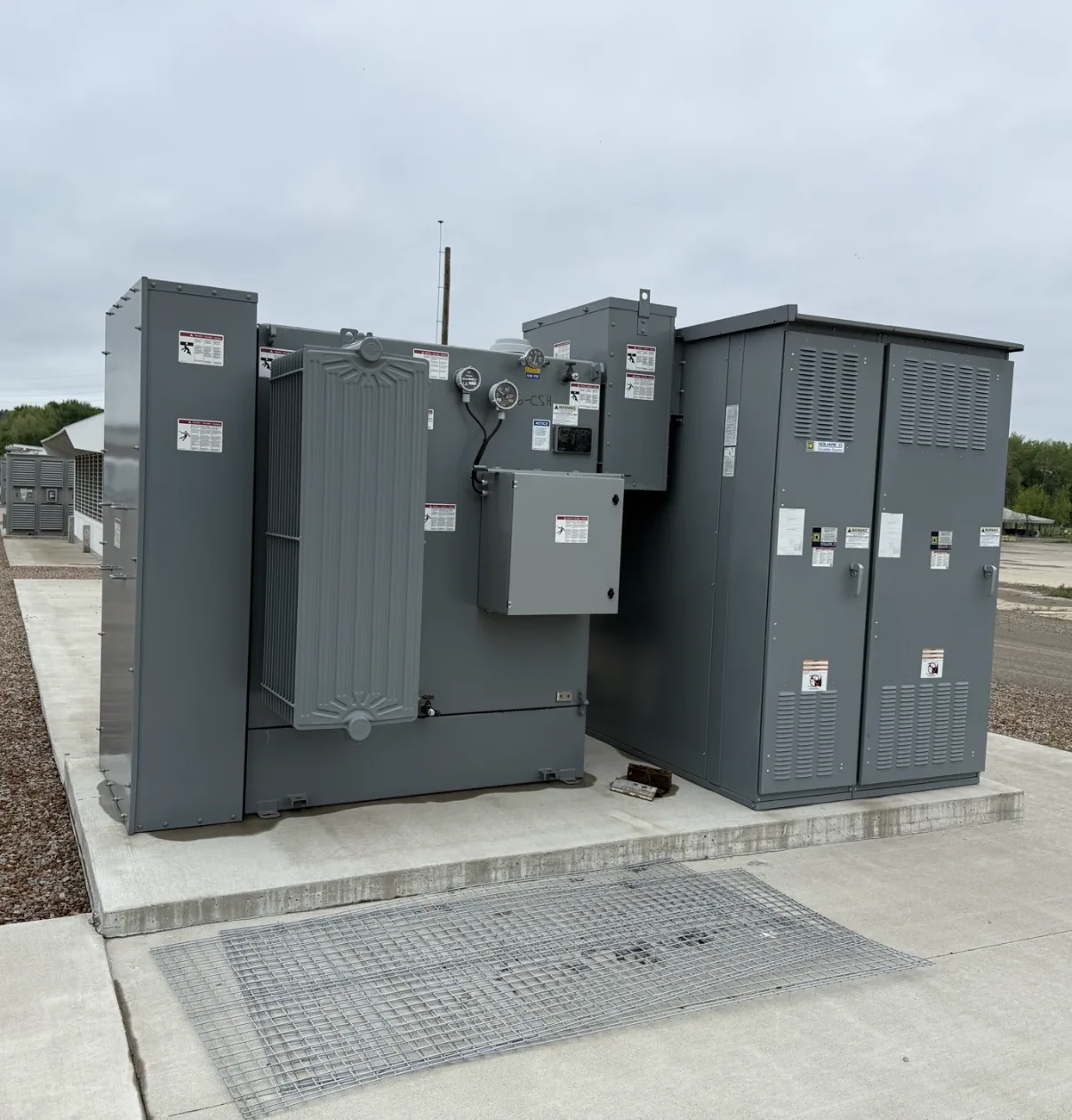 Pad-mount transformer and switching cabinet on a finished pad — McAllen, TX